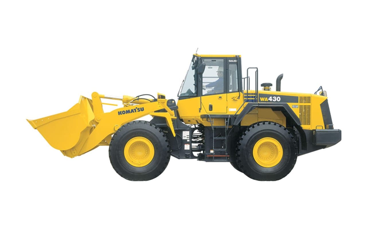 Cargador frontal amarillo sobre neumáticos con balde de 2,5 m³